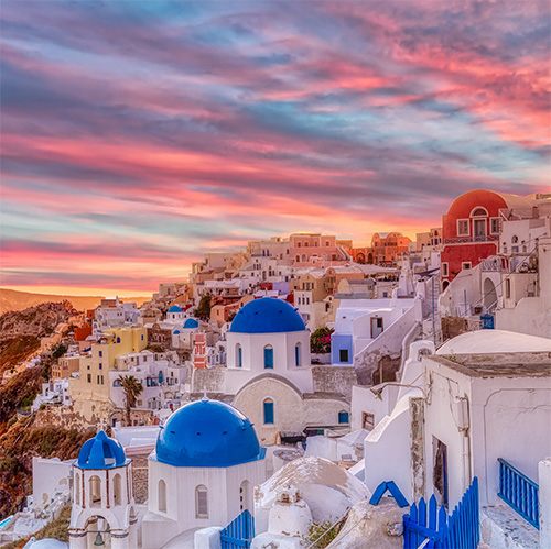 Blue-domed churches of Oia at sunset, Santorini