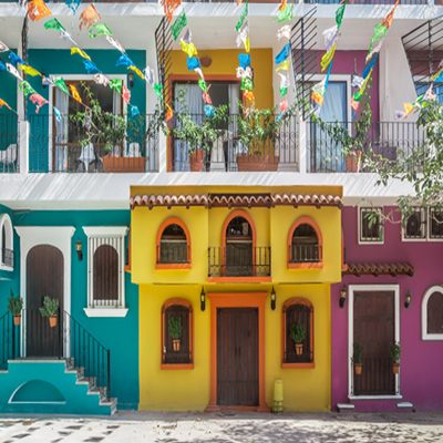 Brightly painted colonial facades in a Mexican town