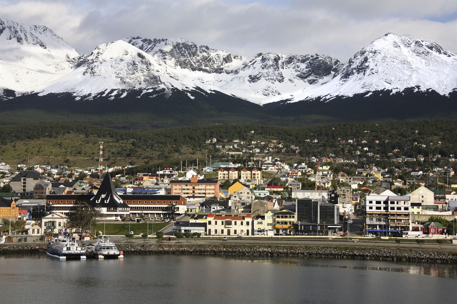 Ushuaia harbour and town below the snow-capped Martial Mountains, Tierra del Fuego, Argentina
